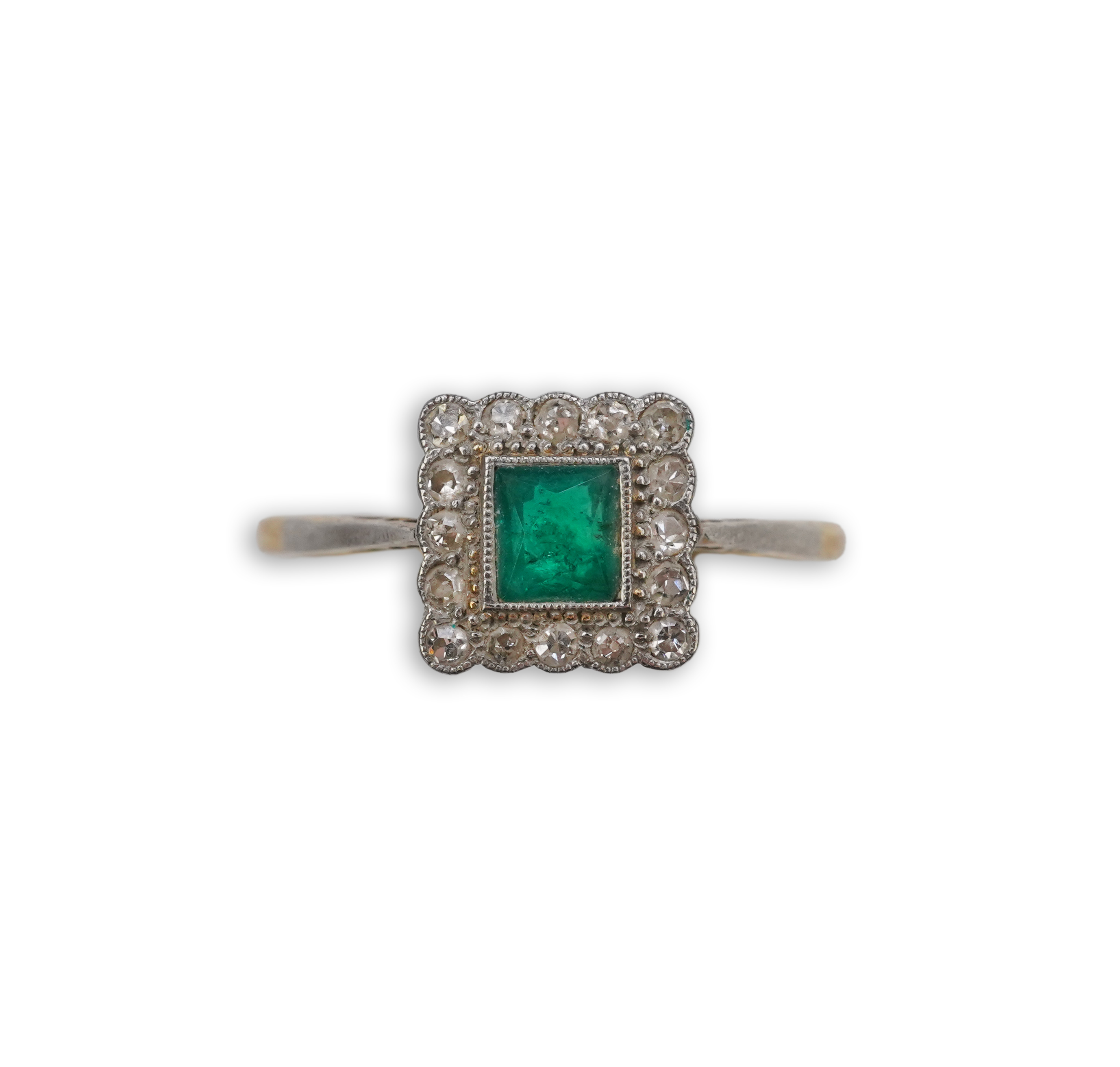 An emerald and diamond ring, early 20th century